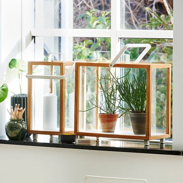 Fyrlykt fra Cane-line i teak / hvid